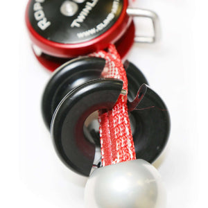 Close-up of ART RopeGuide TwinLine Cambium Saver, essential gear for tree surgeons, featuring robust pulleys and spliced rope.