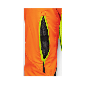 Close-up of STIHL DYNAMIC DuroTEC chainsaw trousers showcasing vibrant orange fabric and zippered pockets for utility.