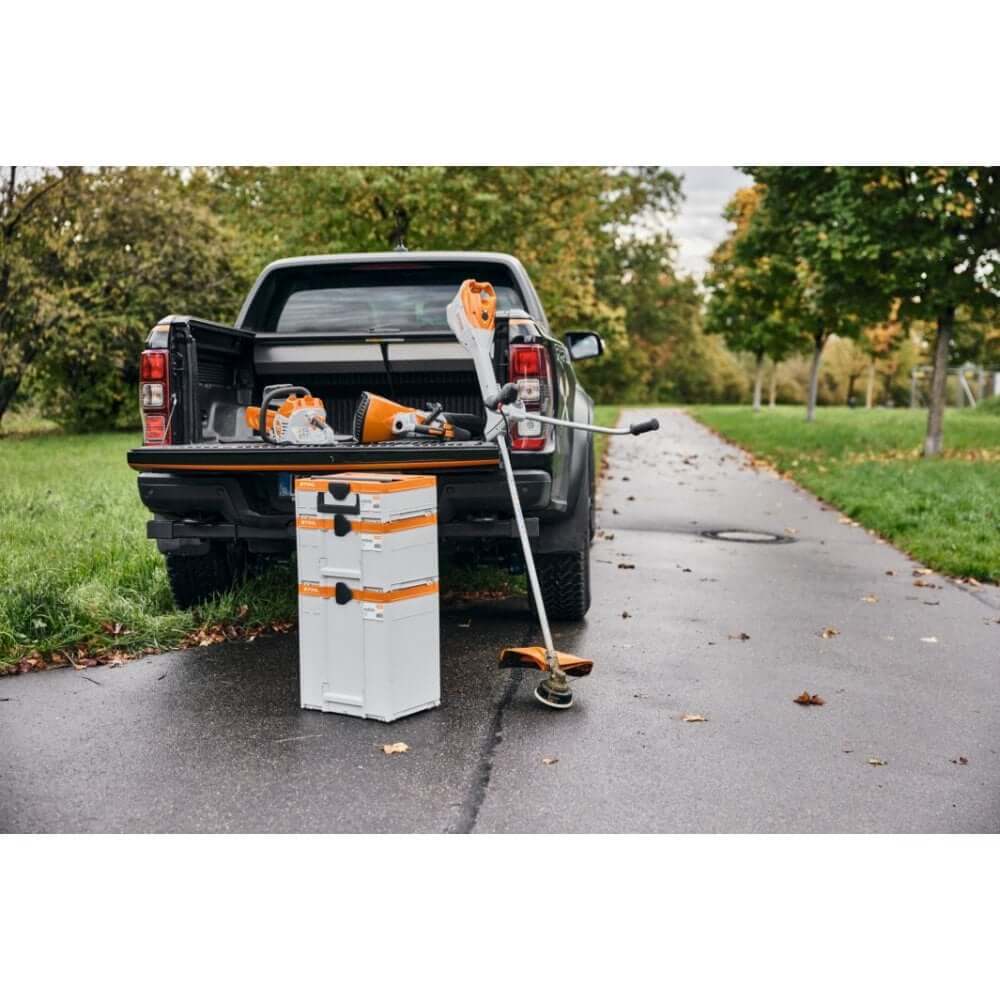 STIHL Battery Box Systainer System with tools on a truck bed, ideal for tree surgeons.