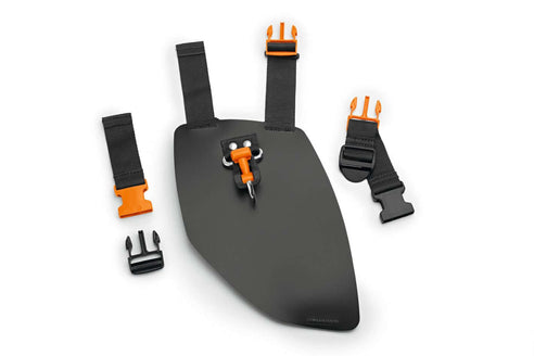 A black support cushion with an orange carry ring and additional straps, designed for use with STIHL FSA, KMA, and BGA tools.