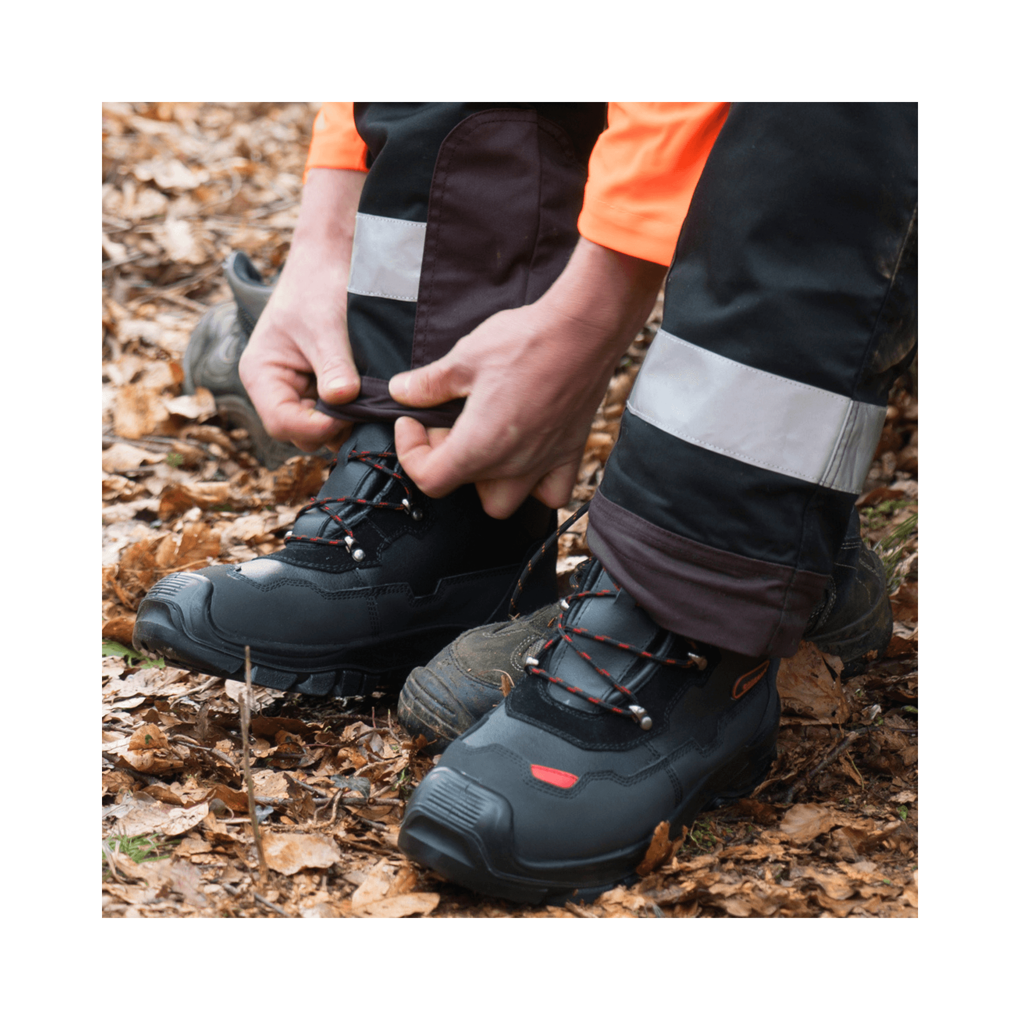 Man tying laces on Yukon Leather Chainsaw Boots, designed for tree surgeons and chainsaw safety.